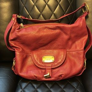 Wine colored medium sized Michael Kors bag. Perfect bad for Spring